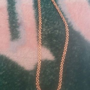 gold necklace  with xxxx